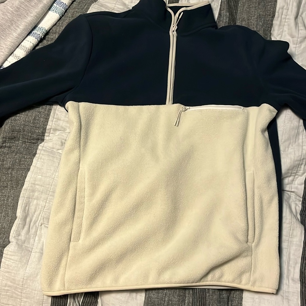 blue and white quarter-zip